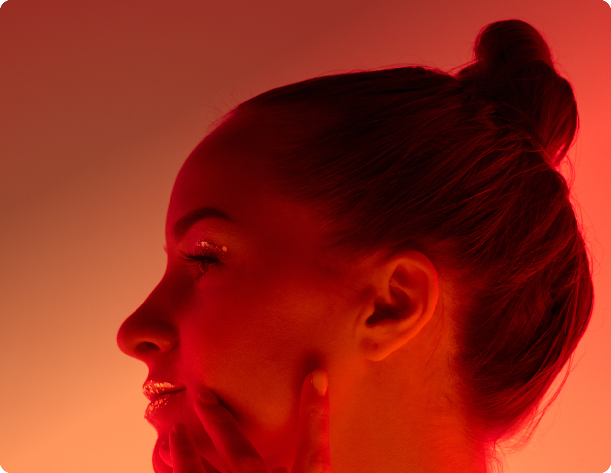 close-up of a woman benefiting from red light therapy